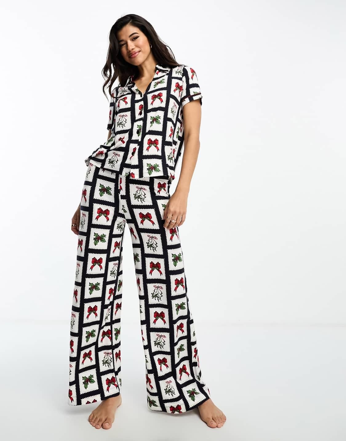 Chelsea Peers christmas bows wide leg pyjamas in navy and white